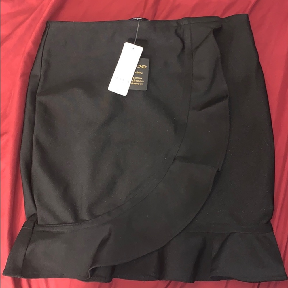 NWT BEBE black bandage miniskirt